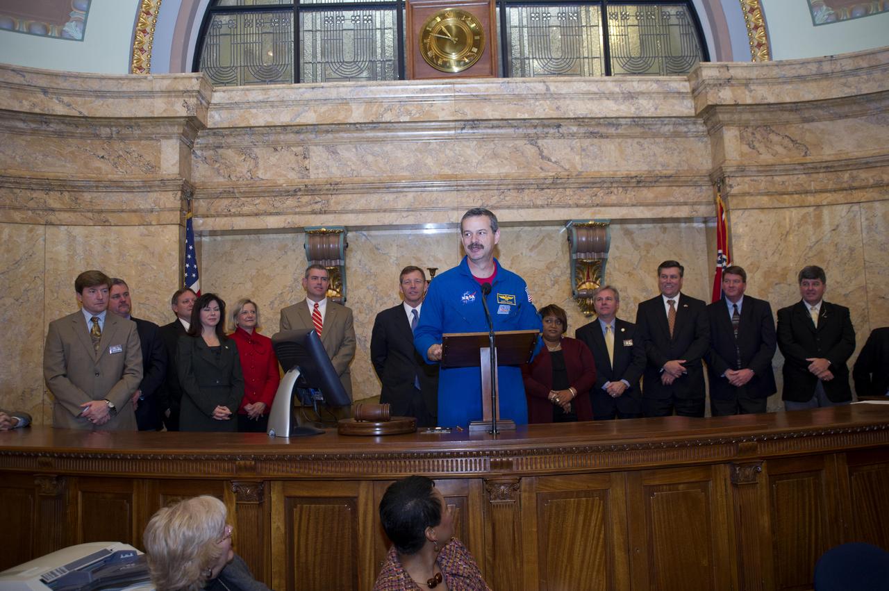 Former astronaut Scott Altman addresses legislators in the Mississippi House of Representatives during NASA Day at the Capitol activities in Jackson on Jan. 12, 2012. During his remarks, Altman was flanked by members of the Mississippi Gulf Coast delegation, as well as Stennis Director Patrick Scheuermann (third from right).