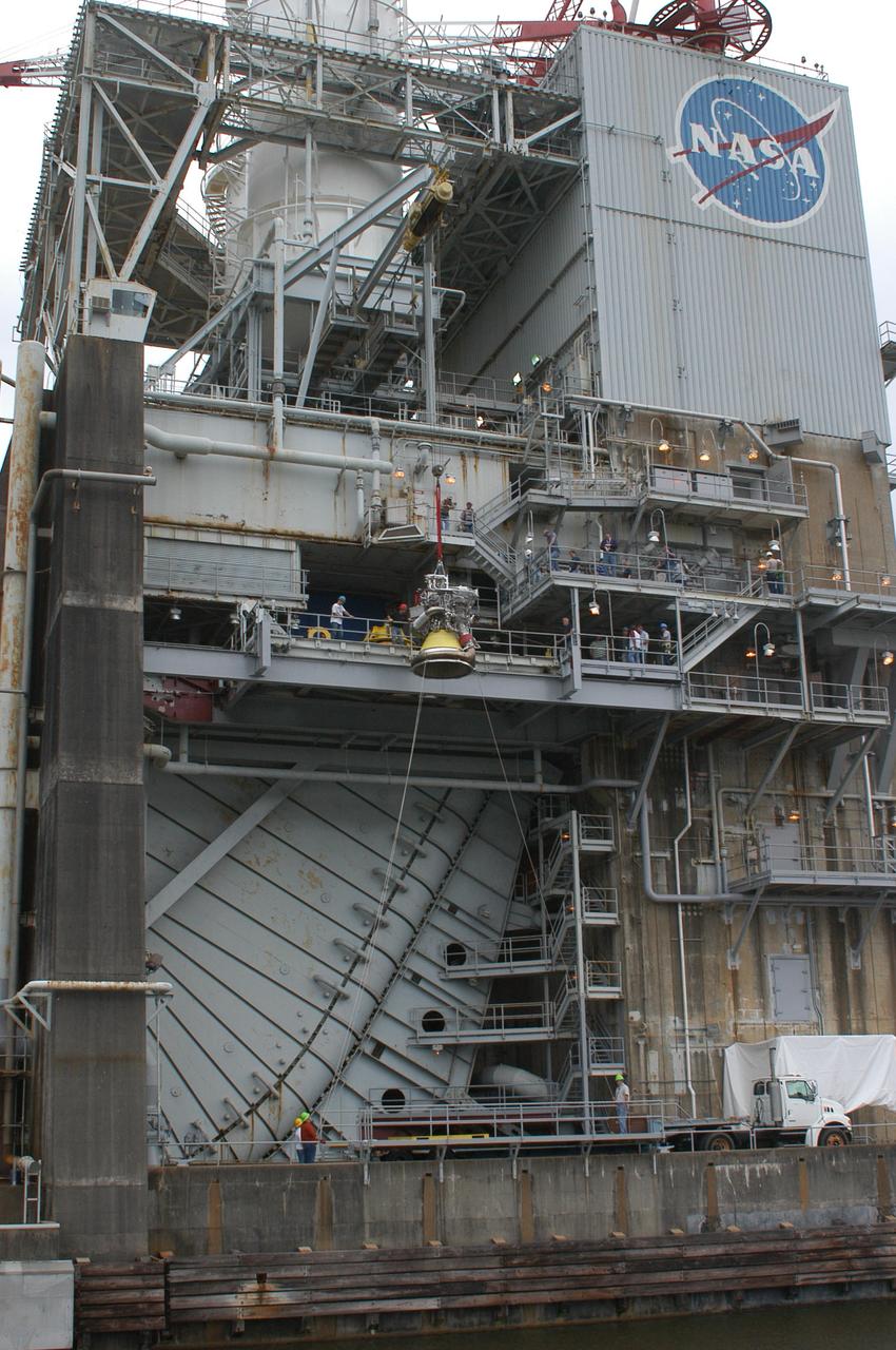 J-2X engine No. 10001 is returned March 8, 2012, to the A-2 Test Stand at Stennis Space Center for its second round of tests. The developmental engine underwent an initial series of tests last year. The J-2X engine is being built for NASA by Pratt & Whitney Rocketdyne.