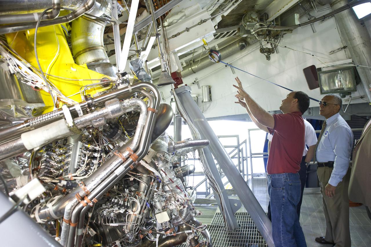 NASA Administrator Charles Bolden (r) takes an up-close look at the first development J-2X rocket engine on the A-2 Test Stand at Stennis Space Center during an April 20, 2012, visit. Pictured with Bolden is A-2 Test Stand Director Skip Roberts. The J-2X engine i s being developed for NASA by Pratt & Whitney Rocketdyne.