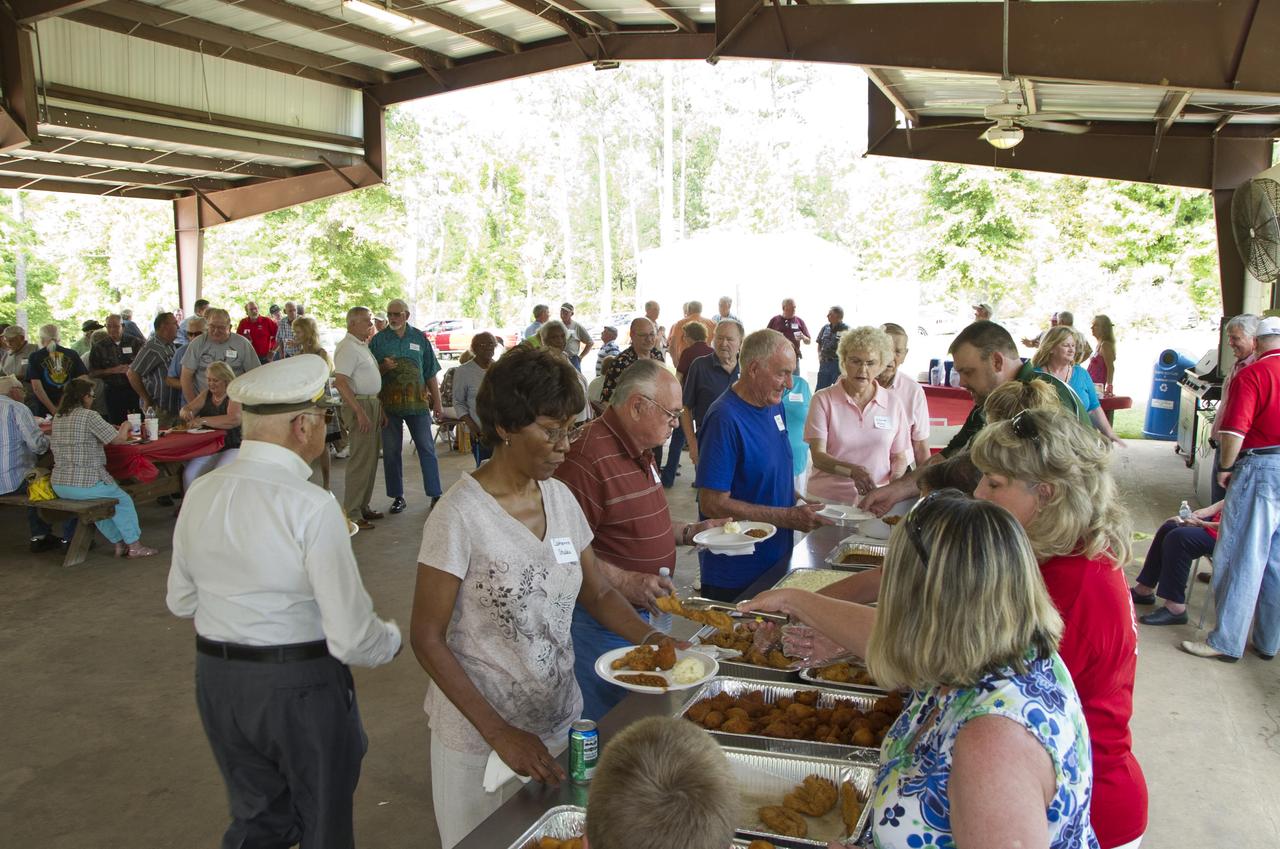 Former Stennis Space Center employees enjoyed a return to the test facility for Old Timers' Day activities May 18, 2012. The annual fellowship was attended by about 150 retirees, guests and employees.