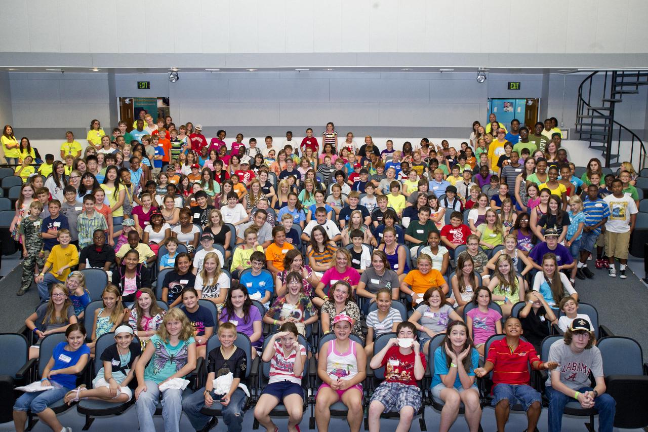 More than 250 children of employees at 15 Stennis Space Center resident agencies and organizations visited the facility July 31 to participate in annual Take Our Children to Work Day activities. Participants enjoyed various presentations and demonstrations on topics such as cryogenics and information security. They also had an opportunity to visit site facilities to learn about various work performed at the NASA center.