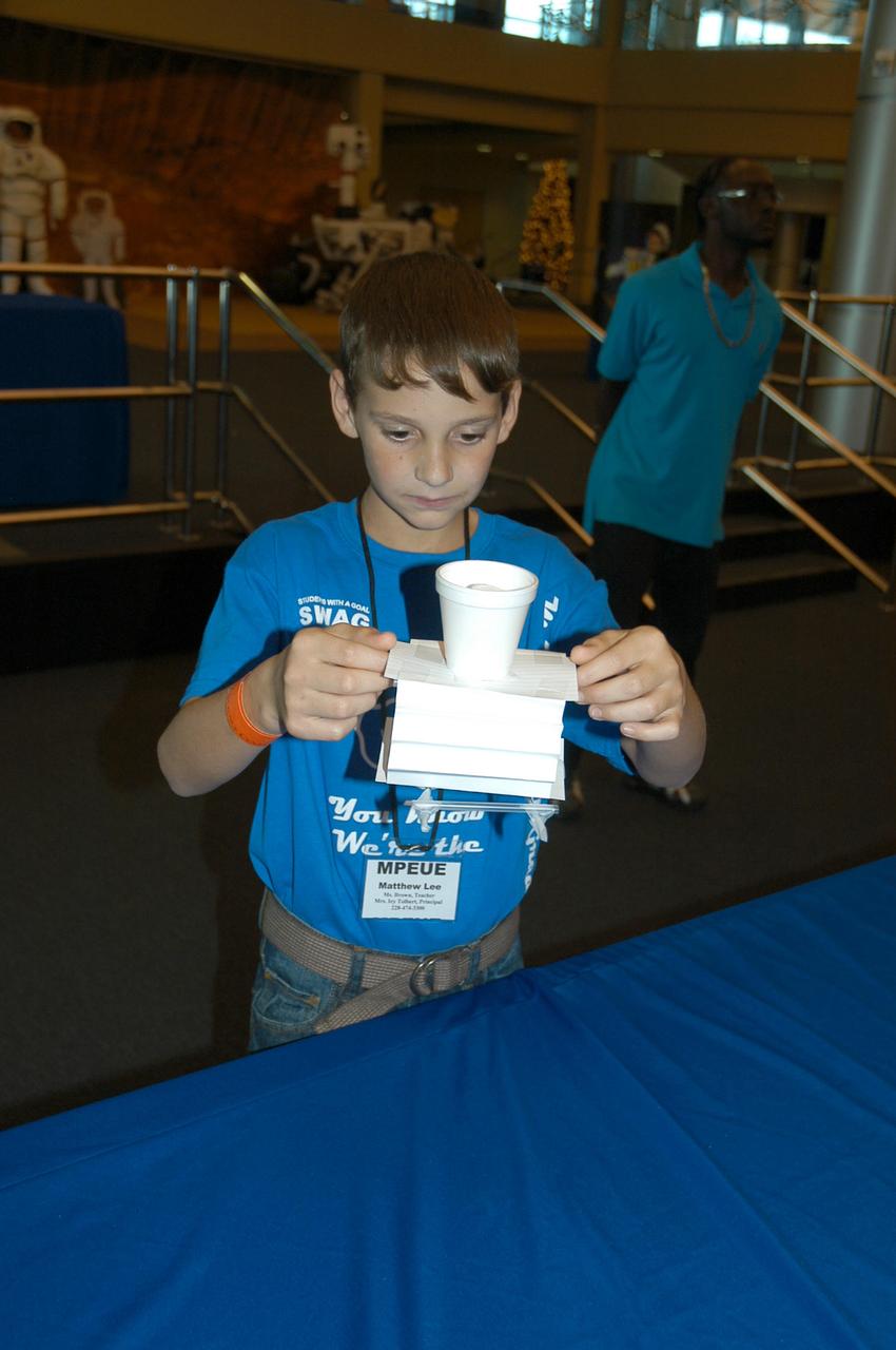 Matthew Lee from Escatawpa Elementary School in Moss Point, Miss., builds a lunar lander model during an activity at INFINITY Science Center, a NASA visitors center, on Dec. 7. NASA hosted two days of activities at the facility to celebrate the Apollo 17 flight to the moon in 1972, the final manned lunar mission of the Apollo Program.