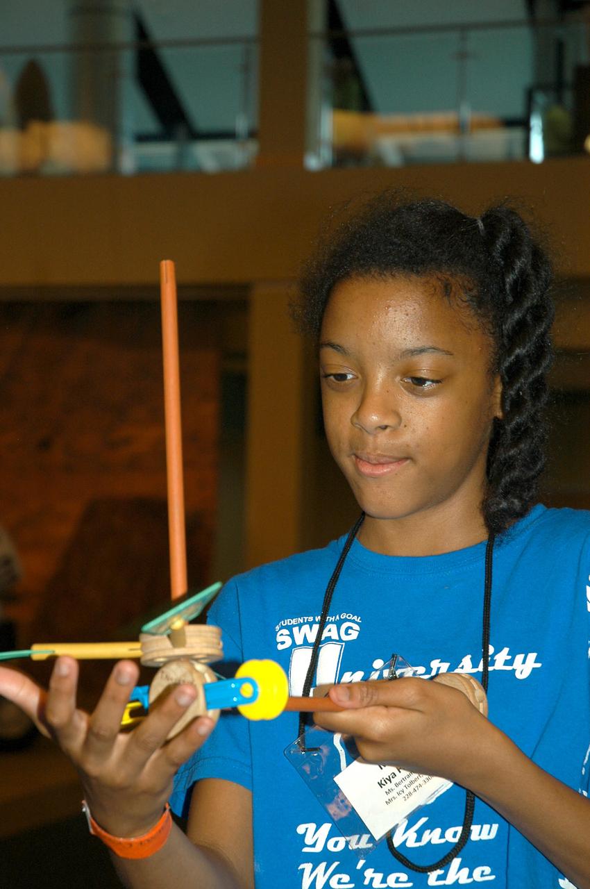 Kiya Franklin from Escatawpa Elementary School in Moss Point, Miss., enjoys a construction activity during her visit to INFINITY Science Center, a NASA visitors center, on Dec. 7. Stennis hosted two days of activities to celebrate the 40th anniversary of the Apollo 17 mission to the moon.