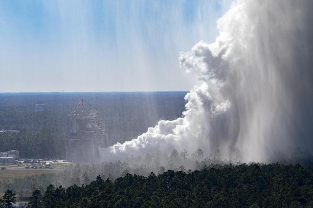 The cloud of steam is visible at NASA’s Stennis Space Center during the Oct. 17 hot fire, which marks the first test in the critical series to support future SLS (Space Launch System) missions to deep space. The steam released during the full duration, 550-second test is water and does not pollute the atmosphere.