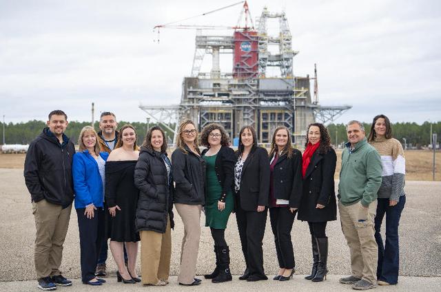 The Pearl River County Leadership Class stands in front of the Thad Cochran Test Stand during a NASA Stennis site tour on Jan. 18. The group learned about the RS-25 engine certification test series underway for future flights of NASA’s SLS (Space Launch System) rocket and preparations for Green Run testing at the Thad Cochran Test Stand (B-2) for NASA’s Exploration Upper Stage (EUS) in support of the Artemis program. EUS is expected to fly on the Artemis IV mission. Prior to that time, it will undergo a series of integrated systems tests to demonstrate it is ready to fly. Through Artemis, NASA will send the first woman and first person of color to the Moon. The agency will use what is learned on and around the Moon to take the next giant leap – sending astronauts to Mars.
