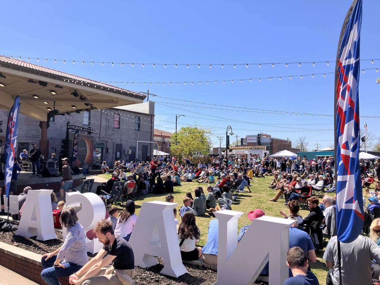 A crowd of people in Russellville, Arkansas, prepare to watch the total solar eclipse on April 8 as Forbes ranked the city as a top spot for viewing.