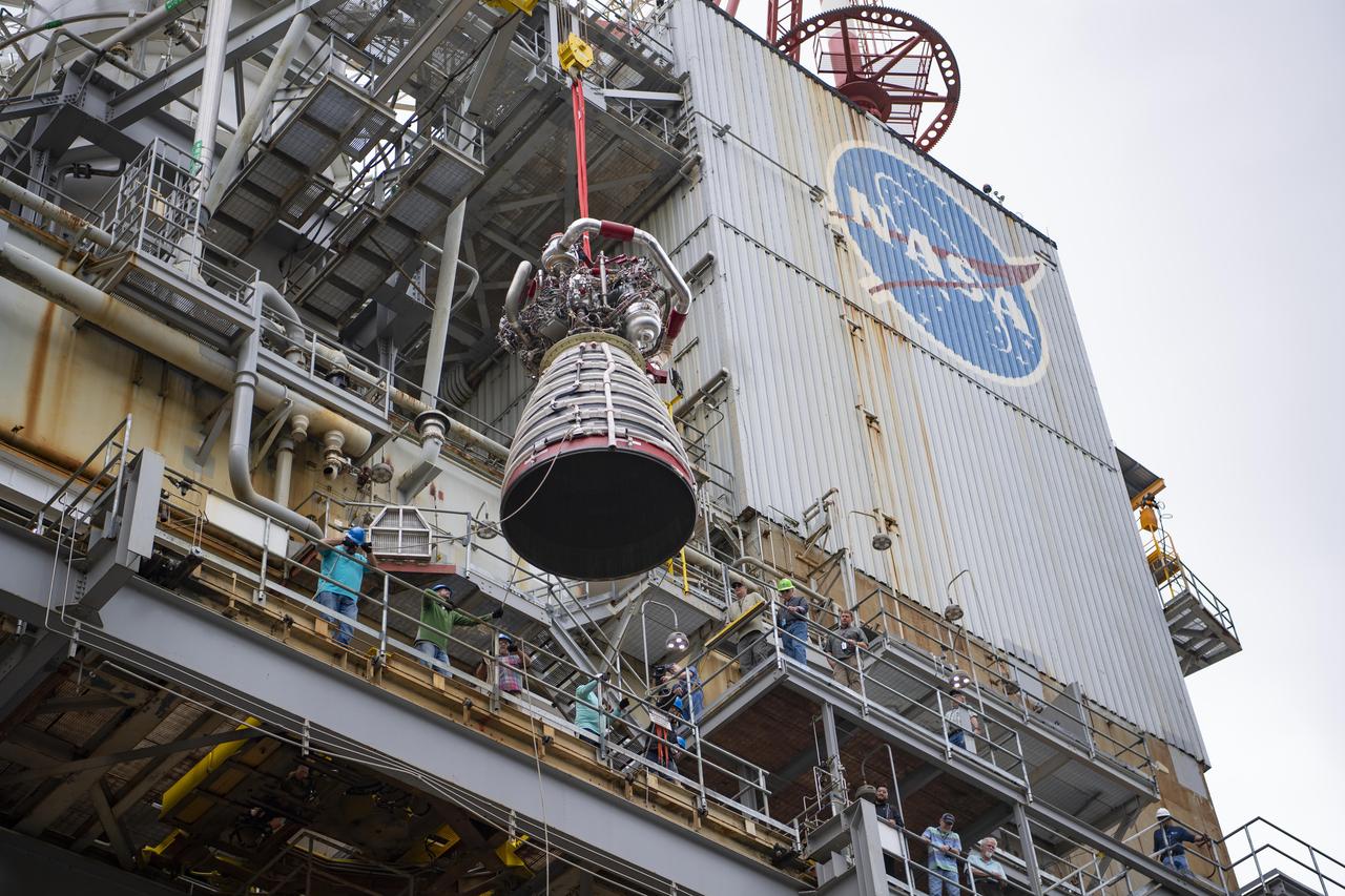 A work crew at NASA’s Stennis Space Center near Bay St. Louis, Mississippi removes RS-25 developmental engine E0525 from the Fred Haise Test Stand on April 9. Removal of the engine follows completion of the second and final 12-test series for lead engines contractor Aerojet Rocketdyne, an L3Harris Technologies company, to certify and build new RS-25 engines for NASA’s SLS (Space Launch System) rockets that will power future lunar missions, beginning with Artemis V. Through Artemis, NASA will establish the foundation for long-term scientific exploration at the Moon; land the first woman, first person of color, and first international partner astronaut on the lunar surface; and prepare for human expeditions to Mars for the benefit of all.
