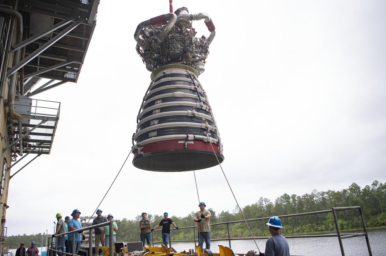 A work crew at NASA’s Stennis Space Center near Bay St. Louis, Mississippi removes RS-25 developmental engine E0525 from the Fred Haise Test Stand on April 9. Removal of the engine follows completion of the second and final 12-test series for lead engines contractor Aerojet Rocketdyne, an L3Harris Technologies company, to certify and build new RS-25 engines for NASA’s SLS (Space Launch System) rockets that will power future lunar missions, beginning with Artemis V. Through Artemis, NASA will establish the foundation for long-term scientific exploration at the Moon; land the first woman, first person of color, and first international partner astronaut on the lunar surface; and prepare for human expeditions to Mars for the benefit of all.