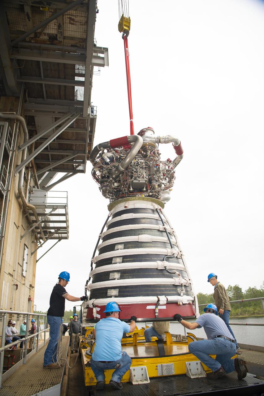 A work crew at NASA’s Stennis Space Center near Bay St. Louis, Mississippi removes RS-25 developmental engine E0525 from the Fred Haise Test Stand on April 9. Removal of the engine follows completion of the second and final 12-test series for lead engines contractor Aerojet Rocketdyne, an L3Harris Technologies company, to certify and build new RS-25 engines for NASA’s SLS (Space Launch System) rockets that will power future lunar missions, beginning with Artemis V. Through Artemis, NASA will establish the foundation for long-term scientific exploration at the Moon; land the first woman, first person of color, and first international partner astronaut on the lunar surface; and prepare for human expeditions to Mars for the benefit of all.