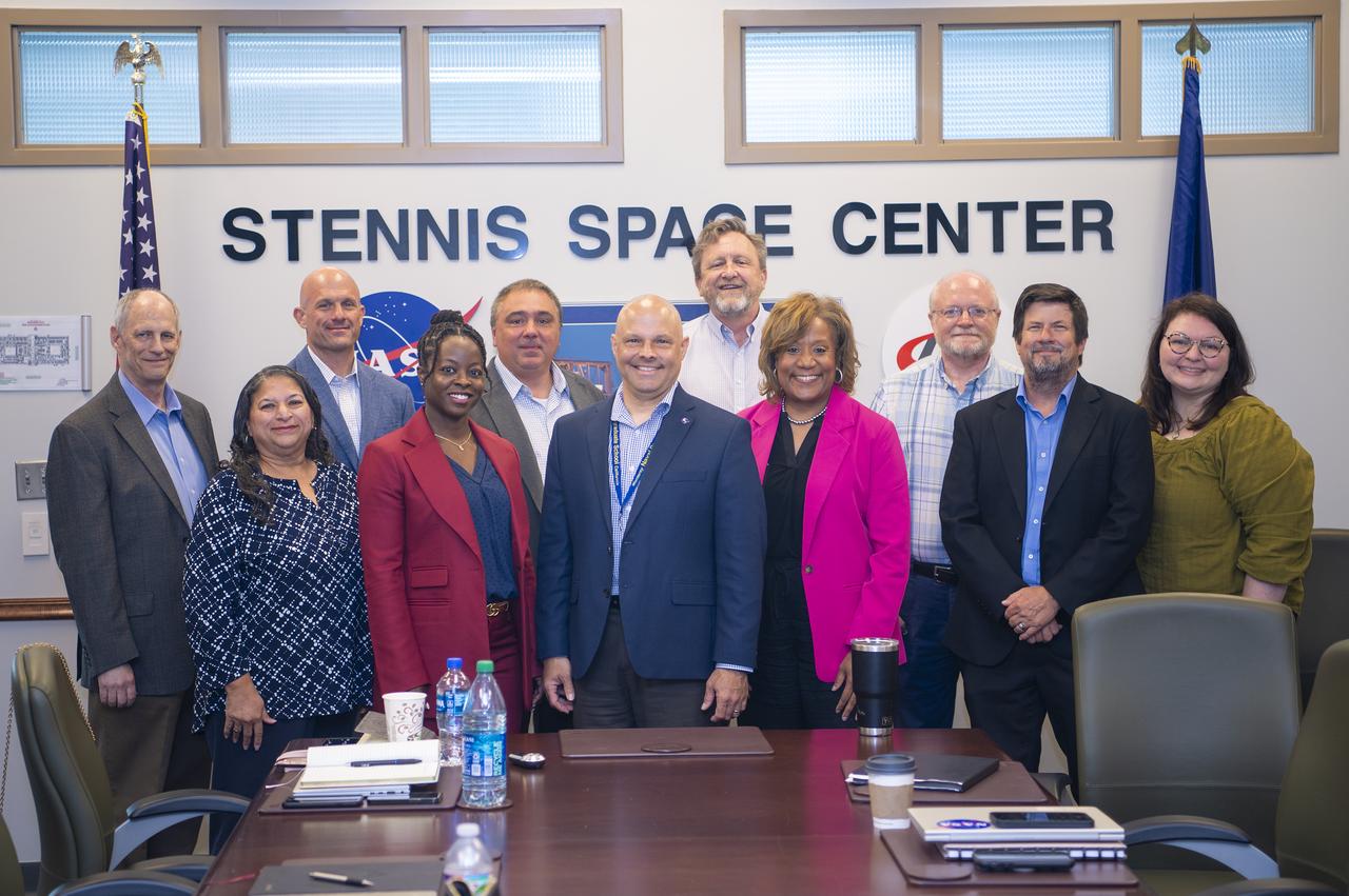 Members of NASA’s Mission Support Directorate met with leaders from NASA’s Stennis Space Center and the NASA Shared Services Center during an onsite visit June 3. The group also participated in an in-depth tour of the NASA Stennis facilities. Pictured (left to right) are Ron Bald, chief counsel for the Office of the General Counsel at NASA Stennis and NASA Shared Services Center; Dinna Cottrell, chief information officer for the NASA Stennis and NASA Shared Services Center Office of the Chief Information Officer; Eli Ouder, procurement officer for NASA Stennis and NASA Shared Services Center; Stacy Houston, executive officer for NASA’s Mission Support Directorate; Michael Tubbs, acting director for the NASA Stennis Center Operations Directorate; Michael Hess, deputy associate administrator for NASA’s Mission Support Directorate; Rodney McKellip, associate director for NASA Stennis; Nichole Pinkney, program manager for NASA’s Mission Support Directorate; Duane Armstrong, manager for the NASA Stennis Strategic Development Office; Gary Benton, director for the NASA Stennis Safety and Mission Assurance Directorate; and Alison Butsch, associate chief financial officer for the External Business Operations Division within the NASA Stennis Office of the Chief Financial Officer.
