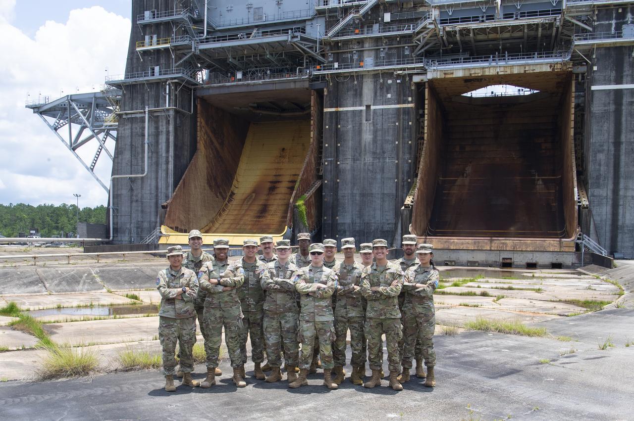 United States Space Force training students and professors stand at the Thad Cochran Test Stand on June 4 during a tour of NASA’s Stennis Space Center. NASA Stennis is preparing the test stand to test the exploration upper stage, which will fly on future SLS (Space Launch System) missions as NASA continues its mission of exploring the secrets of the universe for the benefit of all. The upper stage is being built at NASA’s Michoud Assembly Facility in New Orleans as a more powerful second stage to send the Orion spacecraft to deep space. It is expected to fly on the Artemis IV mission. Before that, it will be installed on the Thad Cochran Test Stand (B-2) at NASA Stennis to undergo a series of Green Run tests of its integrated systems to demonstrate it is ready to fly. The Space Force, established in 2019, organizes, trains, and equips personnel to protect U.S. and allied interests in space and to provide space capabilities to the joint forces.
