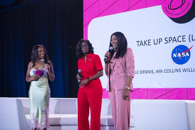 Girls United co-founder Rechelle Dennis, left, introduces NASA Assistant Deputy Associate Administrator for the Moon to Mars Program Office Lakiesha Hawkins, center, and NASA Director of Engagement Aya Collins, right, for a Take Up Space (Literally) panel conversation during the 30th annual ESSENCE Fest event in New Orleans on July 5.