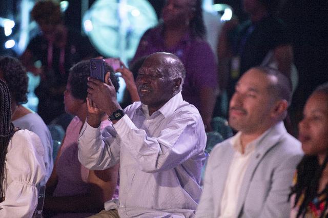 An audience member takes a photo as NASA representatives participate in a Take Up Space (Literally) panel conversation during the 30th annual ESSENCE Fest in New Orleans on July 5.