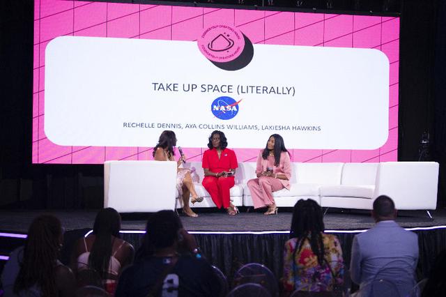 Girls United co-founder Rechelle Dennis, left, moderates a conversation with NASA Assistant Deputy Associate Administrator for the Moon to Mars Program Office Lakiesha Hawkins, center, and NASA Director of Engagement Aya Collins at the Take Up Space (Literally) panel presentation during the 30th annual ESSENCE Fest in New Orleans on July 5.