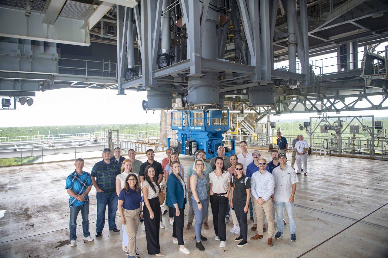 Congressional staff delegates representing eight states (Alabama, California, Colorado, Illinois, Louisiana, Maryland, New Jersey, and New York), along with NASA and U.S. Air Force representatives, tour the Thad Cochran Test Stand (B-2) at NASA Stennis on July 16. The visit provided an opportunity for the group to learn about propulsion test work carried out onsite by NASA and commercial companies.