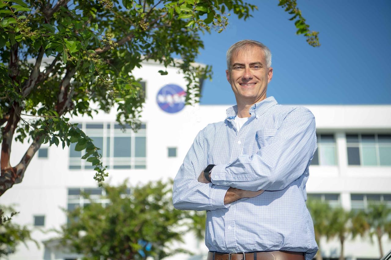 Joseph Ladner stands at NASA’s Stennis Space Center near Bay St. Louis, Mississippi, where he leads a team managing the budgets to fund the nation’s premier propulsion test site.