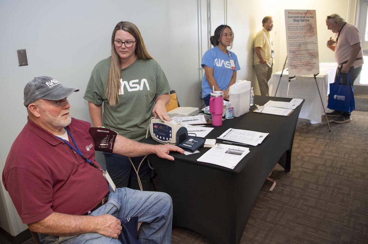 NASA Stennis employees visit booths with safety and health information in the Roy S. Estess Building during the annual Safety and Health Day at NASA’s Stennis Space Center on Sept. 26. The yearly event is a reminder to the NASA Stennis workforce about the importance of a safe work environment and provided the opportunity for a health screening.