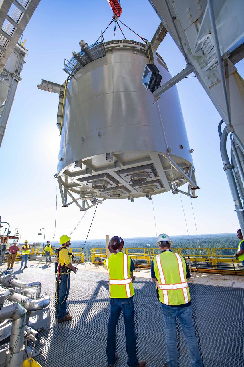 Teams at NASA’s Stennis Space Center complete a safe lift and install of an interstage simulator unit needed for future testing of NASA’s exploration upper stage (EUS) in the B-2 position of the Thad Cochran Test Stand. The lift and install, completed over a two-week period that began Oct. 10, marks a milestone for testing the new SLS (Space Launch System) rocket stage that will fly on future Artemis missions to the Moon and beyond. The EUS will undergo a series of Green Run tests of its integrated systems prior to its first flight. During testing, the interstage simulator component will function like the SLS interstage section that helps protect the upper stage during Artemis launches.