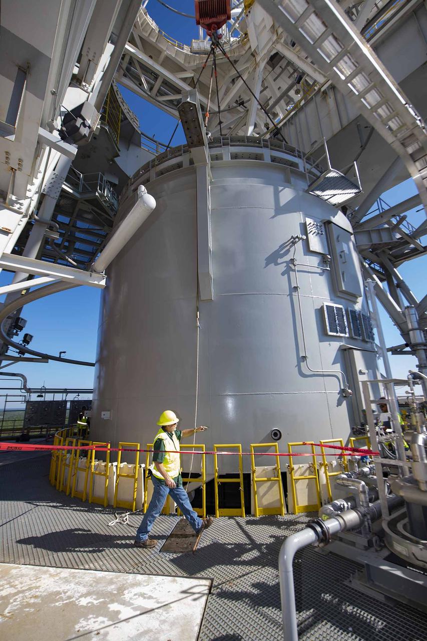Teams at NASA’s Stennis Space Center complete a safe lift and install of an interstage simulator unit needed for future testing of NASA’s exploration upper stage (EUS) in the B-2 position of the Thad Cochran Test Stand. The lift and install, completed over a two-week period that began Oct. 10, marks a milestone for testing the new SLS (Space Launch System) rocket stage that will fly on future Artemis missions to the Moon and beyond. The EUS will undergo a series of Green Run tests of its integrated systems prior to its first flight. During testing, the interstage simulator component will function like the SLS interstage section that helps protect the upper stage during Artemis launches.