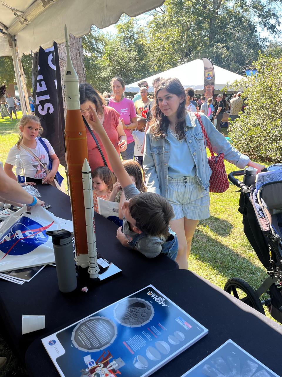 NASA Stennis representatives inspire the Artemis Generation Oct. 12 at the Wild Things event celebrating National Wildlife Refuge Week in Lacombe, Louisiana. Participants played a game to identify different phases of the Moon and learned more about NASA’s return to the Moon. The event was hosted by Friends of Louisiana Wildlife Refuges, Inc. and Southeast Louisiana National Wildlife Refuges Complex at Bayou Lacombe Center, headquarters for the nine National Wildlife Refuges in southeast Louisiana.