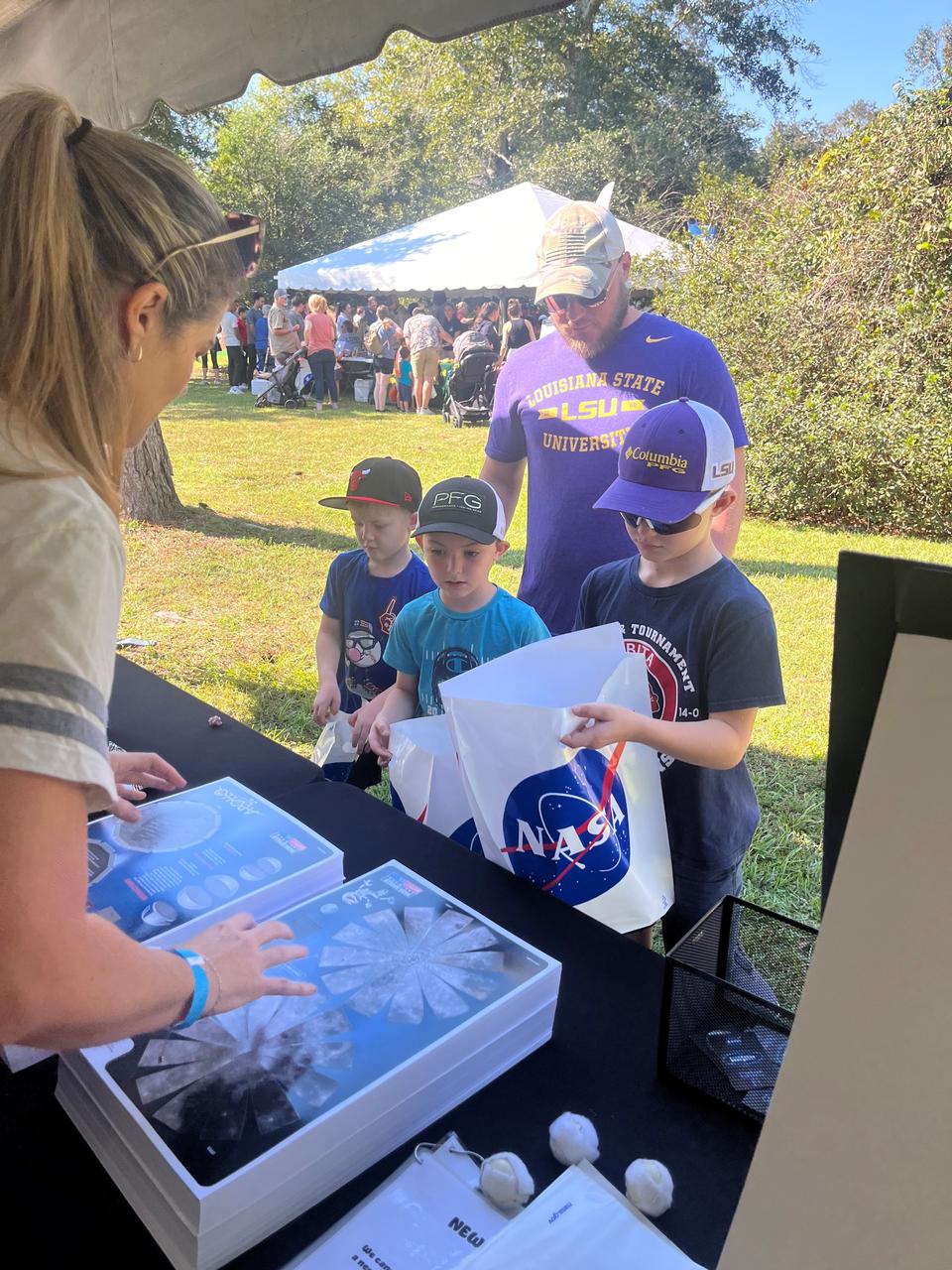 NASA Stennis representatives inspire the Artemis Generation Oct. 12 at the Wild Things event celebrating National Wildlife Refuge Week in Lacombe, Louisiana. Participants played a game to identify different phases of the Moon and learned more about NASA’s return to the Moon. The event was hosted by Friends of Louisiana Wildlife Refuges, Inc. and Southeast Louisiana National Wildlife Refuges Complex at Bayou Lacombe Center, headquarters for the nine National Wildlife Refuges in southeast Louisiana.