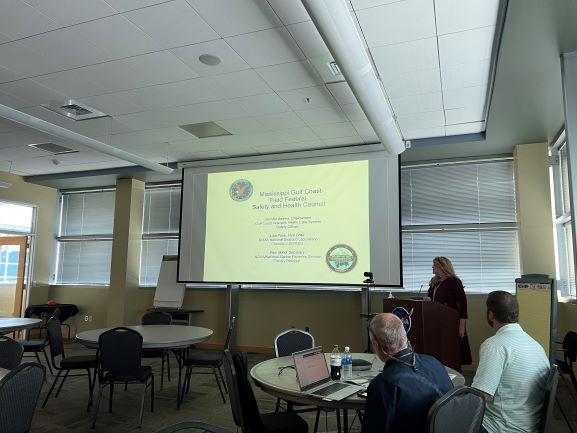 Jennifer Adams, representing the Gulf Coast Veterans Health Care System, speaks during the Mississippi/Louisiana Gulf Coast Voluntary Protection Program (VPP) Local Area Council Meeting on Oct. 29, hosted by NASA’s Stennis Space Center at INFINITY Science Center. The regional meeting focused on how workplace safety team members can achieve and maintain consistent and effective safety and health programs for their current and potential OSHA VPP worksites across south Mississippi and Louisiana.