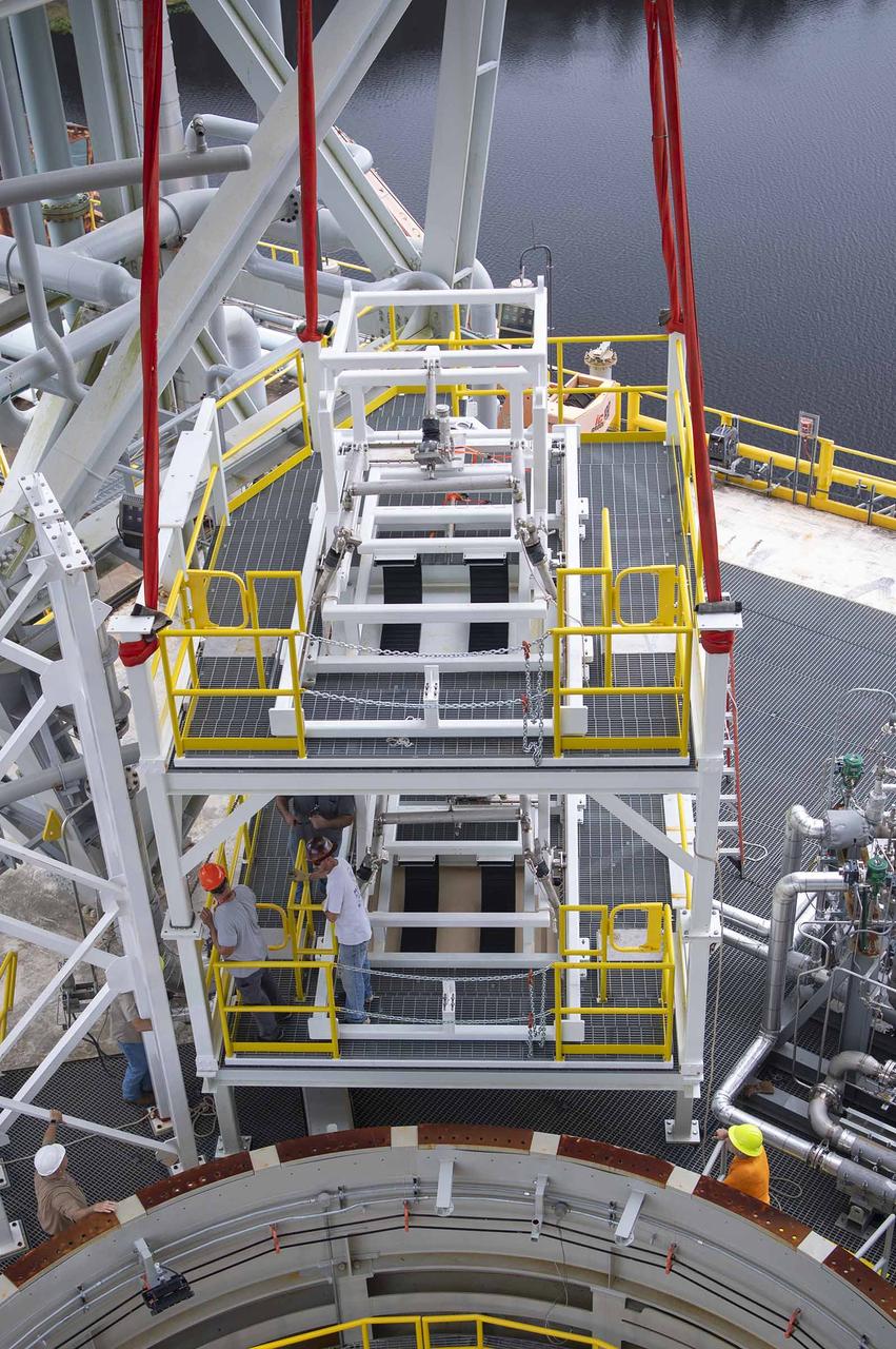 A pair of umbilical support structures needed for future testing of NASA’s exploration upper stage (EUS) were installed in the B-2 position of the Thad Cochran Test Stand on Oct. 30-31 at NASA’s Stennis Space Center.  The support structures arrived from NASA’s Michoud Assembly Facility in New Orleans via the unique NASA Stennis seven-and-a-half-mile canal system in 2023. Since then, crews have prepared the structures that will align with the EUS unit for installation. In addition to helping secure the unit in place during hot fire testing, the umbilical support structures are where the command, control, and data electrical connections are mated to connect the ground systems to the vehicle systems, as well as most the commodity connections such as liquid hydrogen, liquid oxygen, hydrogen vent, helium bottle fill pressure, and purges.  Prior to its initial flight, the EUS unit will undergo a series of so-called Green Run tests at NASA Stennis to ensure all systems are ready to go. The test series will culminate with a hot fire of the stage’s four RL10 engines, made by Aerojet Rocketdyne, an L3Harris Technologies company and lead SLS engines contractor. The new upper stage will enable NASA to carry larger payloads on Artemis missions to the Moon and beyond.