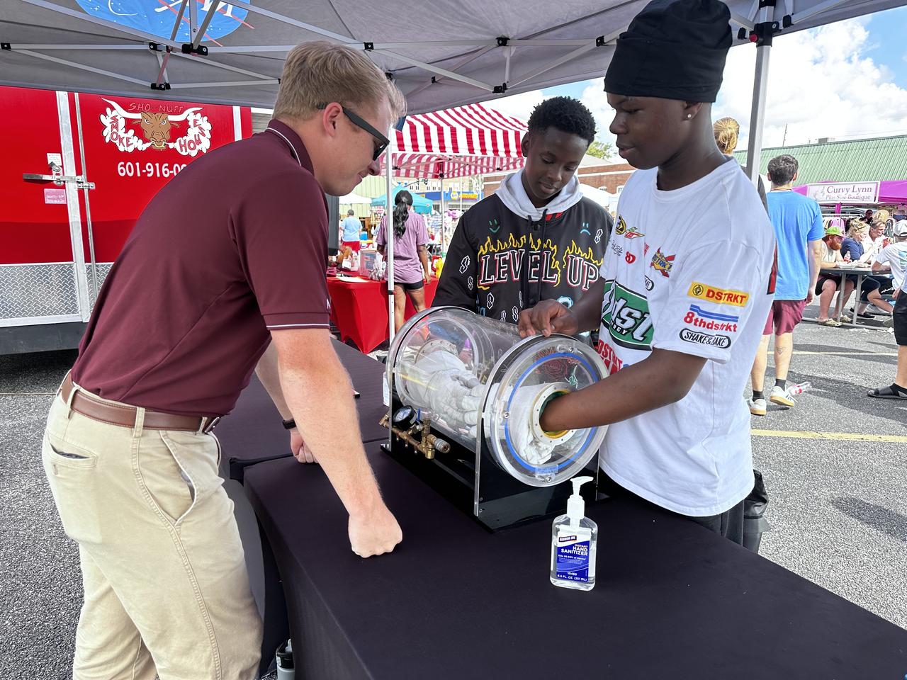 NASA Stennis representatives engage with the Artemis Generation at the Picayune Street Fair in Picayune, Mississippi on Nov. 2-3. The south Mississippi NASA center is located less than 15 miles from Picayune with many employees living in the community. NASA Stennis tests all RS-25 engines to help power NASA’s SLS (Space Launch System) rocket on Artemis missions. The NASA center is also preparing to conduct a full series of tests on the agency’s exploration upper stage to demonstrate it is ready to fly on future Artemis missions. With the Artemis campaign, NASA will land the first woman and the first person of color on the Moon, using innovative technologies to explore more of the lunar surface than ever.