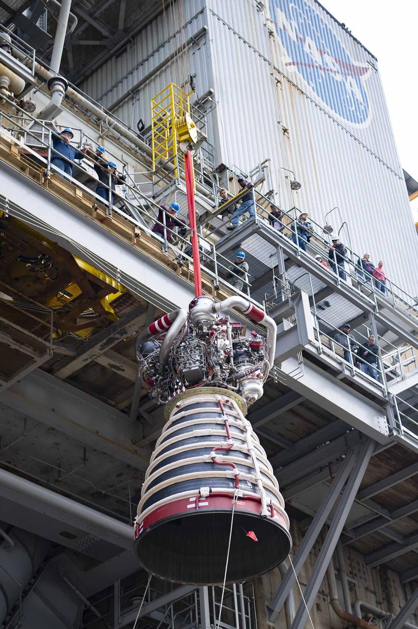 Teams at NASA’s Stennis Space Center deliver, lift, and install the first new production RS-25 engine on the Fred Haise Test Stand on Feb. 18.