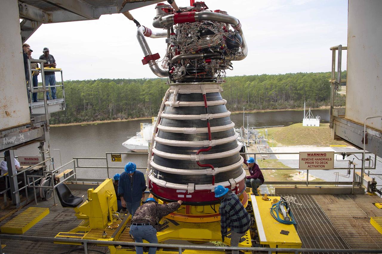 Teams at NASA’s Stennis Space Center deliver, lift, and install the first new production RS-25 engine on the Fred Haise Test Stand on Feb. 18.