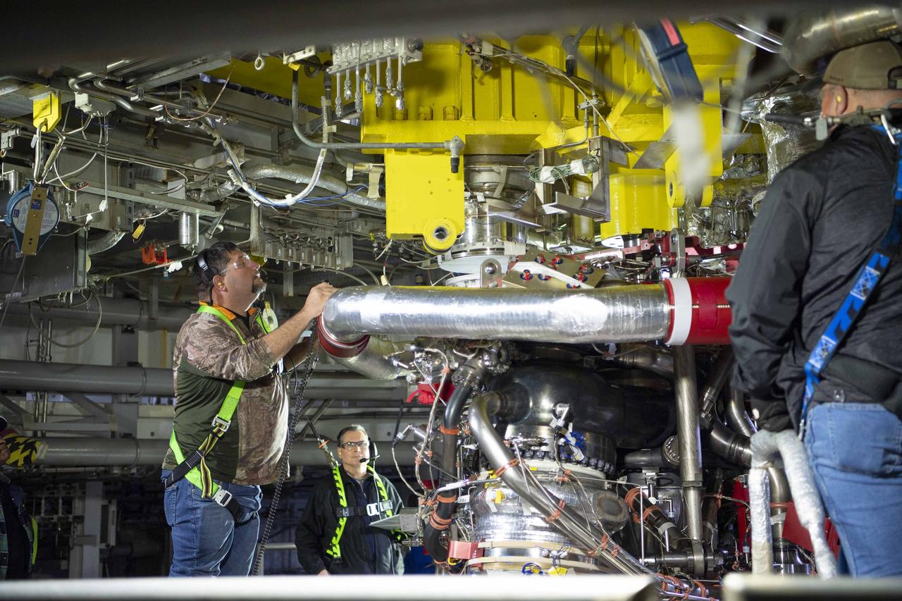 Teams at NASA’s Stennis Space Center deliver, lift, and install the first new production RS-25 engine on the Fred Haise Test Stand on Feb. 18.