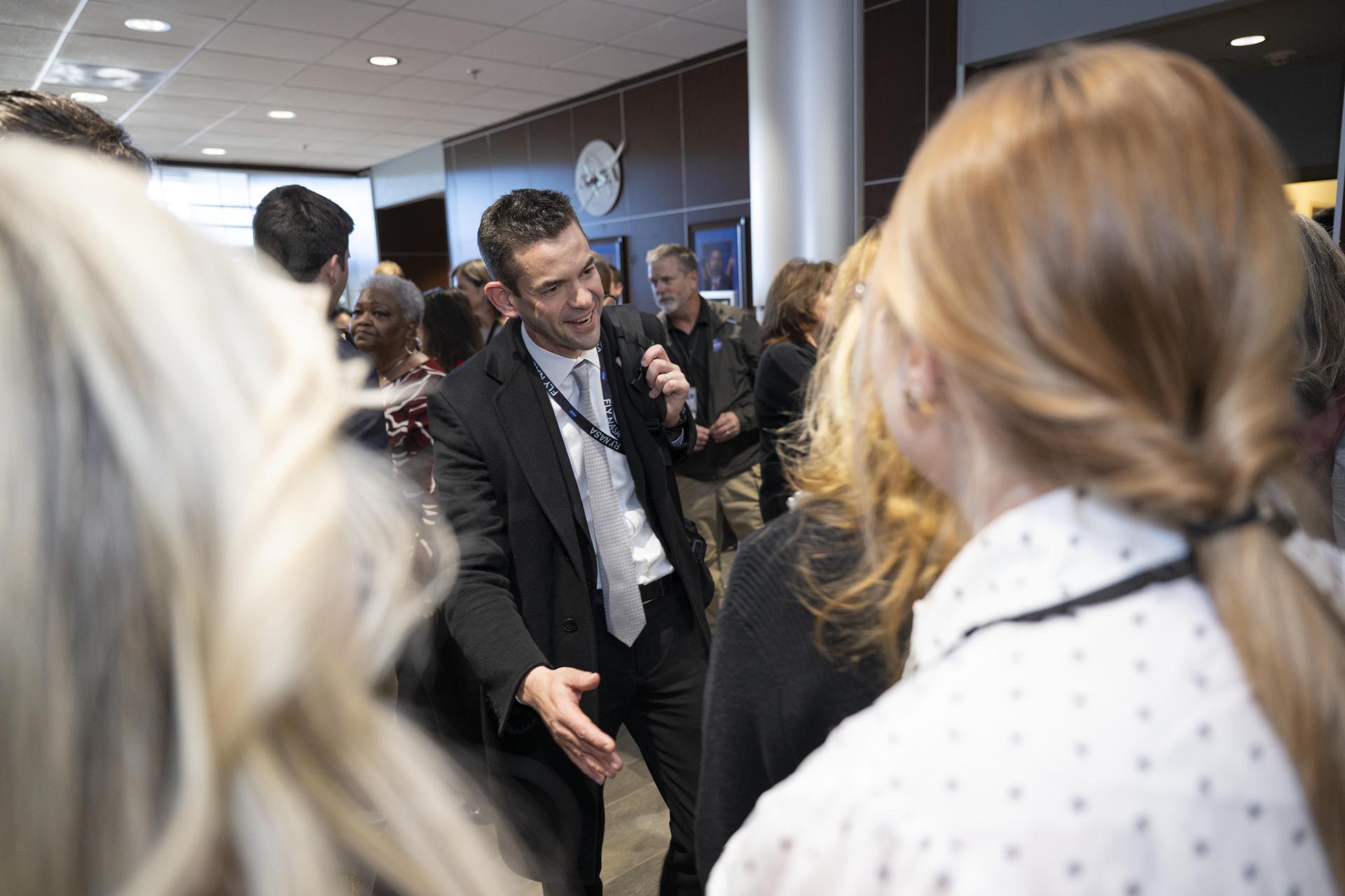 NASA Administrator Jared Isaacman, center, meets with NASA employees during his visit to NASA’s Stennis Space Center near Bay St. Louis, Mississippi, on Jan. 15, 2026. Isaacman, NASA’s 15th administrator, began visiting the agency’s centers after his appointment on Dec. 17, 2025.