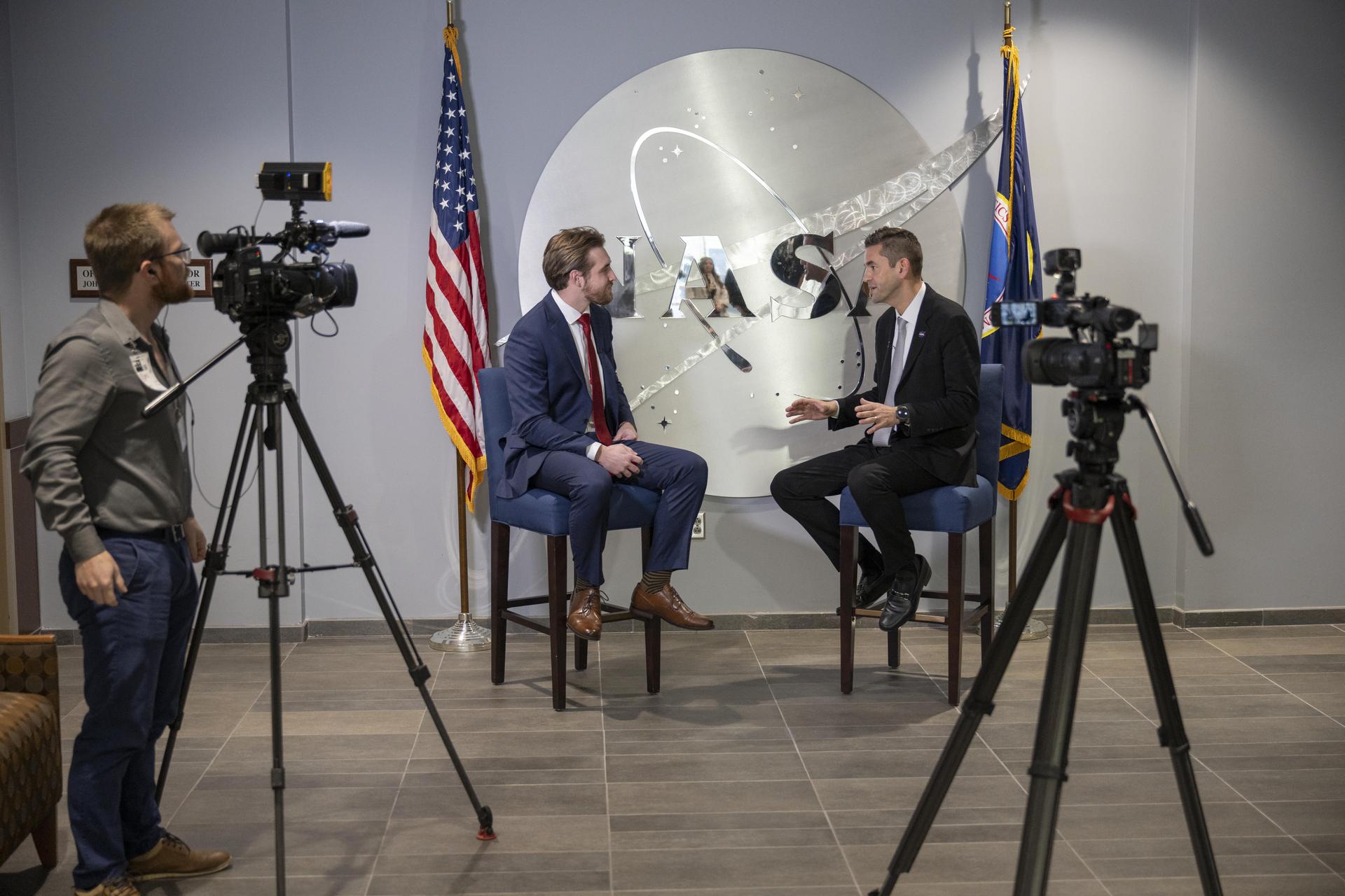 NASA Administrator Jared Isaacman, right, speaks with Tyler Bell, multimedia journalist at WLOX-TV, during an interview at NASA’s Stennis Space Center near Bay St. Louis, Mississippi, on Jan. 15, 2026. Isaacman, NASA’s 15th administrator, began visiting the agency’s centers after his appointment on Dec. 17, 2025.