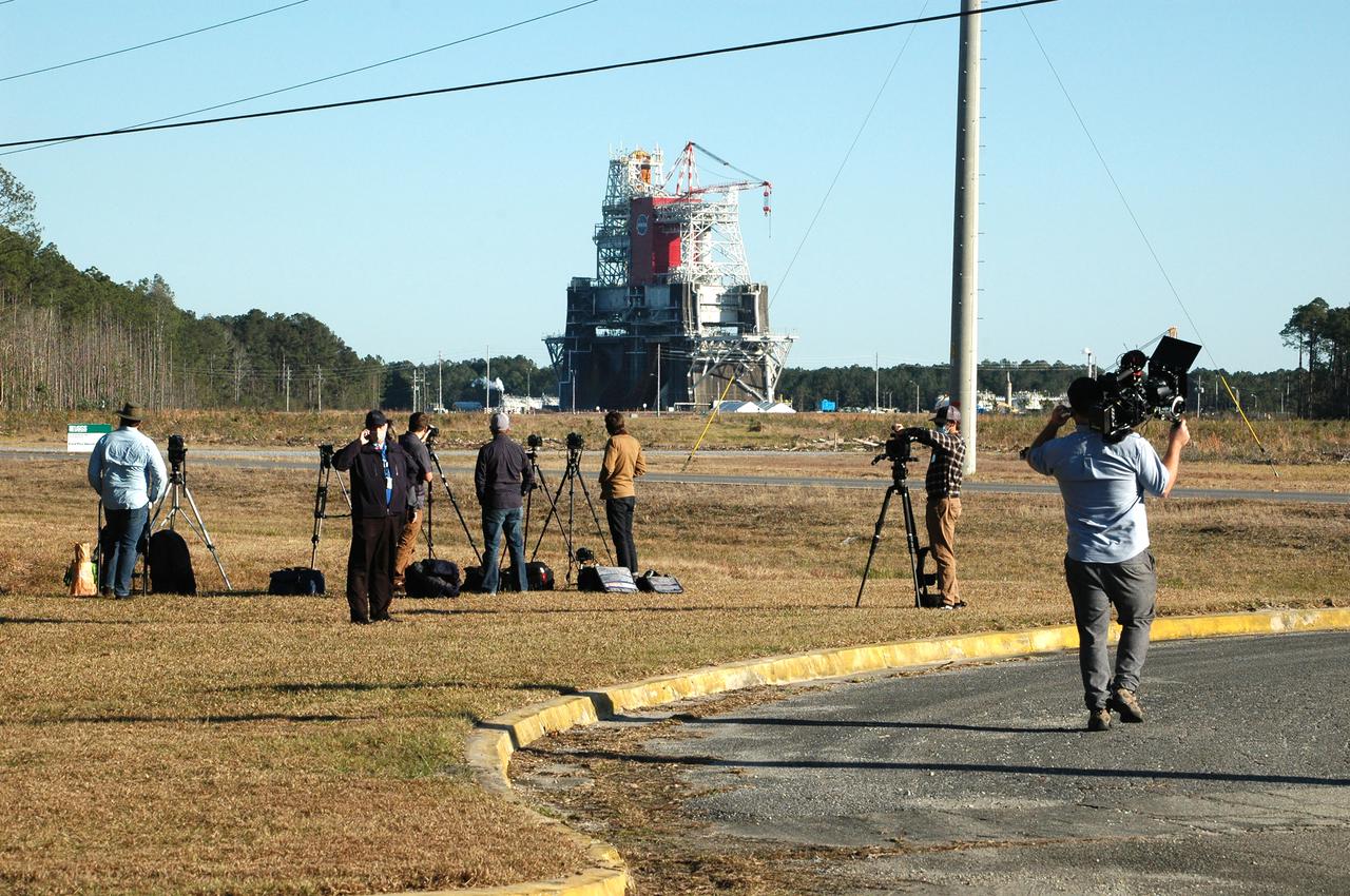 Members of the media stake out viewing spots prior to the Green Run hot fire test of the core stage for NASA’s Space Launch System (SLS) rocket at Stennis Space Center near Bay St. Louis, Mississippi, on Jan. 16, 2021. NASA conducted a hot fire test of the core stage’s four RS-25 engines on the B-2 Test Stand at Stennis. Scheduled for as long as eight minutes, the engines fired for a little more than one minute to generate a combined 1.6 million pounds of thrust, just as will occur during an actual launch. The hot fire is the final test of the Green Run test series, a comprehensive assessment of the SLS core stage prior to launching the Artemis I mission to the Moon.