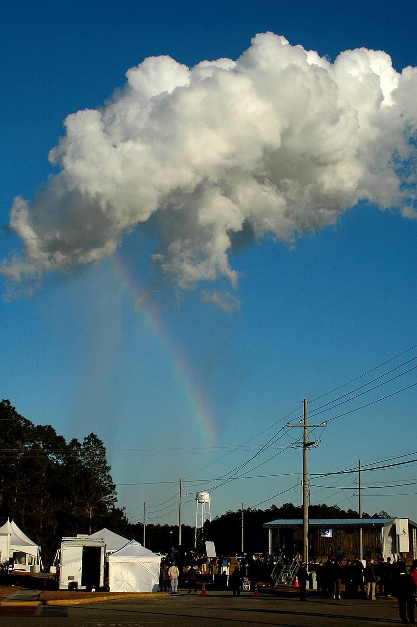 A rainbow appears as the steam cloud dissipates following the Green Run hot fire test of the core stage for NASA’s Space Launch System (SLS) rocket on Saturday, January 16, 2021. NASA conducted a hot fire test of the core stage’s four RS-25 engines on the B-2 Test Stand at Stennis Space Center near Bay St. Louis, Mississippi. Scheduled for as long as eight minutes, the engines fired for a little more than one minute to generate a combined 1.6 million pounds of thrust, just as will occur during an actual launch. The hot fire is the final test of the Green Run test series, a comprehensive assessment of the SLS core stage prior to launching the Artemis I mission to the Moon.