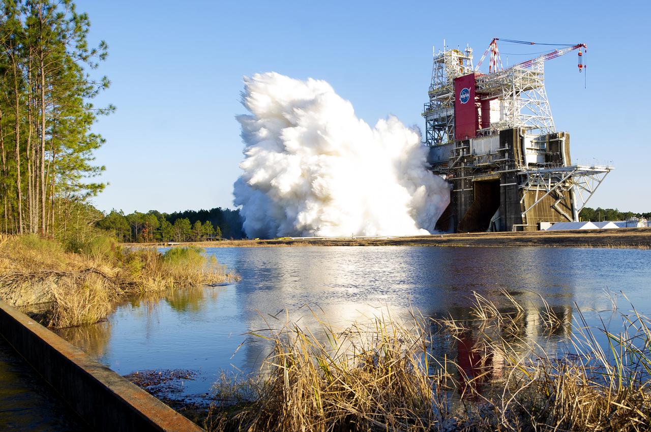 NASA conducts a hot fire test Jan. 16, 2021, of the core stage for the agency’s Space Launch System rocket on the B-2 Test Stand at Stennis Space Center near Bay St. Louis. The hot fire test of the stage’s four RS-25 engines generated a combined 1.6 million pounds of thrust, just as will occur during an actual launch The hot fire is the final test of the Green Run test series, a comprehensive assessment of the SLS core stage prior to launching the Artemis I mission to the Moon.