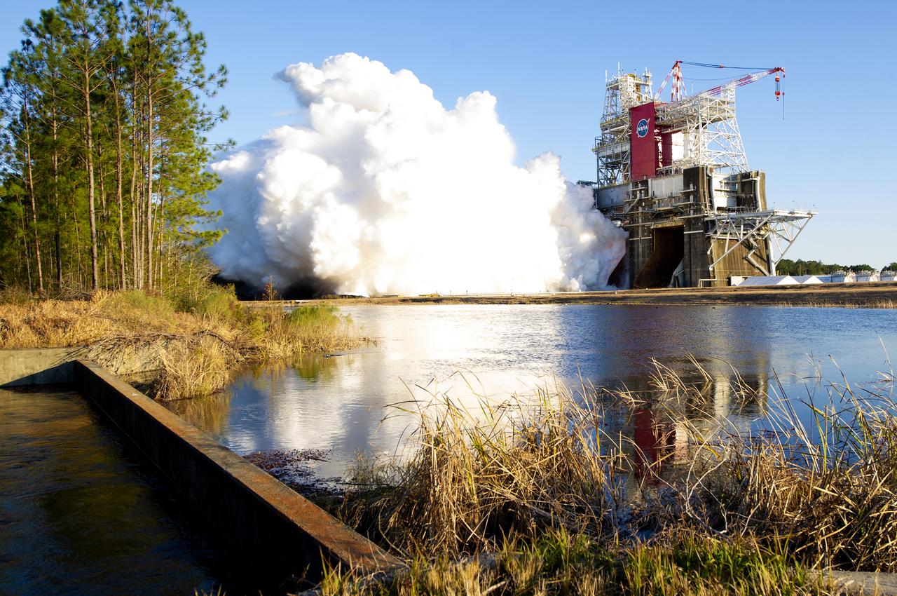 NASA conducts a hot fire test Jan. 16, 2021, of the core stage for the agency’s Space Launch System rocket on the B-2 Test Stand at Stennis Space Center near Bay St. Louis. The hot fire test of the stage’s four RS-25 engines generated a combined 1.6 million pounds of thrust, just as will occur during an actual launch. The hot fire is the final test of the Green Run test series, a comprehensive assessment of the SLS core stage prior to launching the Artemis I mission to the Moon.