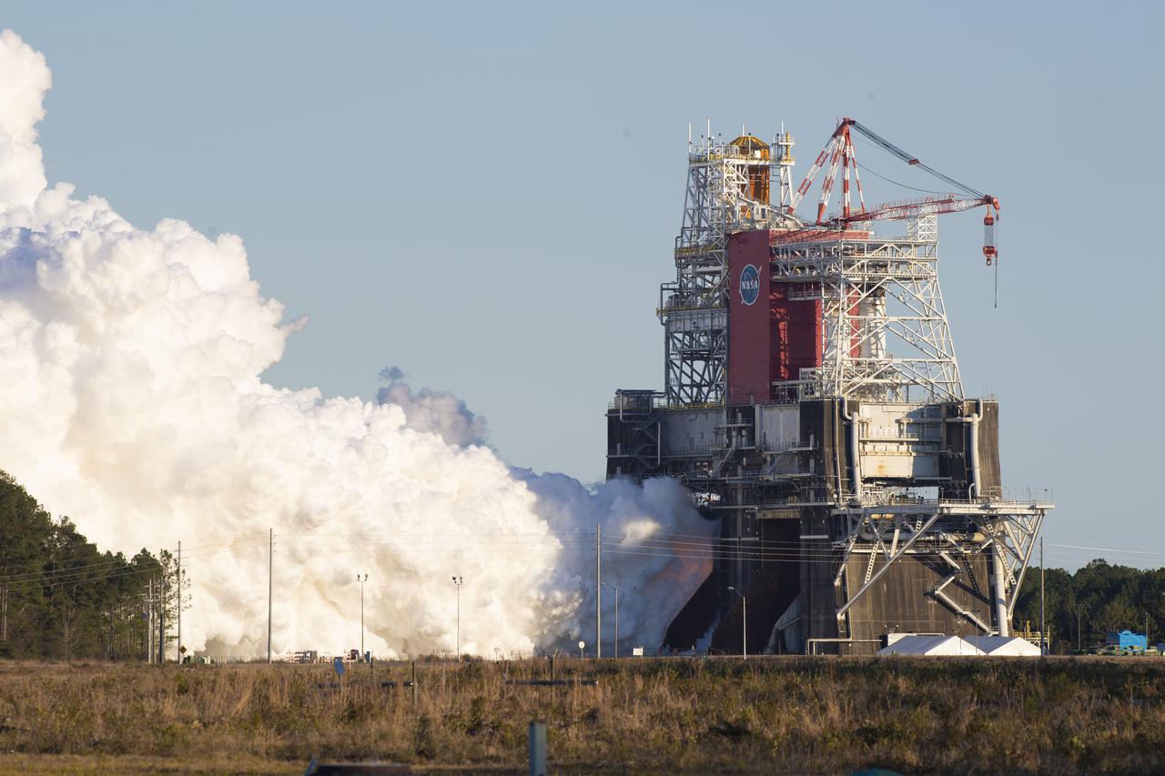 NASA conducts a hot fire test Jan. 16, 2021, of the core stage for the agency’s Space Launch System rocket on the B-2 Test Stand at Stennis Space Center near Bay St. Louis. The hot fire test of the stage’s four RS-25 engines generated a combined 1.6 million pounds of thrust, just as will occur during an actual launch. The hot fire is the final test of the Green Run test series, a comprehensive assessment of the SLS core stage prior to launching the Artemis I mission to the Moon.