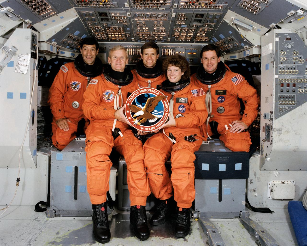 STS054-S-002 (August 1992) --- The five NASA astronauts assigned to fly aboard the space shuttle Endeavour for the mission pose for a crew portrait on the flight deck. Left to right are astronauts Mario Runco, mission specialist; John H. Casper, commander; Donald R. McMonagle, pilot; and mission specialists Susan J. Helms and Gregory J. Harbaugh.