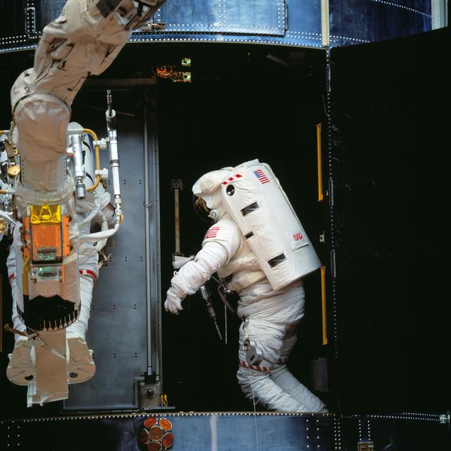 NASA image: Astronauts Akers and Thornton during installation of COSTAR on HST