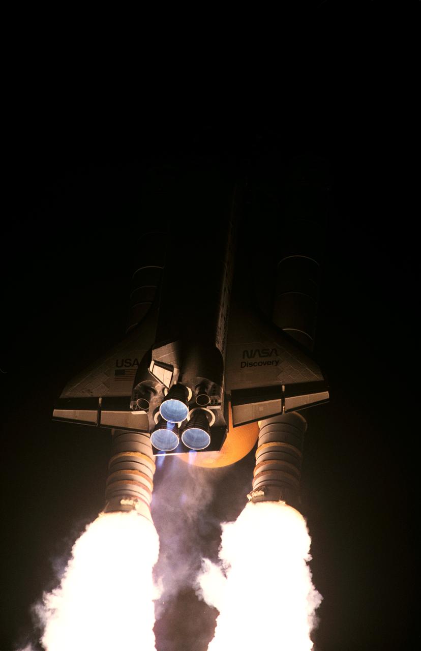 STS063-S-003 (3 Feb. 1995) --- A 35mm camera was used to expose this image of the space shuttle Discovery as it began its race to catch up with the Russia's Mir Space Station.  Liftoff from Launch Pad 39B, Kennedy Space Center (KSC) occurred at 12:22:04 (EST), Feb. 3, 1995. Discovery is the first in the current fleet of four space shuttle vehicles to make 20 launches. Onboard for the 67th (STS-63 is out of sequence) shuttle flight are astronauts James D. Wetherbee, commander; Eileen M. Collins, pilot; Bernard A. Harris Jr., payload commander; and mission specialists Janice Voss and C. Michael Foale; along with Russian cosmonaut Vladimir G. Titov. Photo credit: NASA