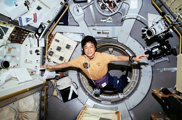 NASA image: STS-65 Payload Specialist Mukai enters IML-2 spacelab module aboard OV-102