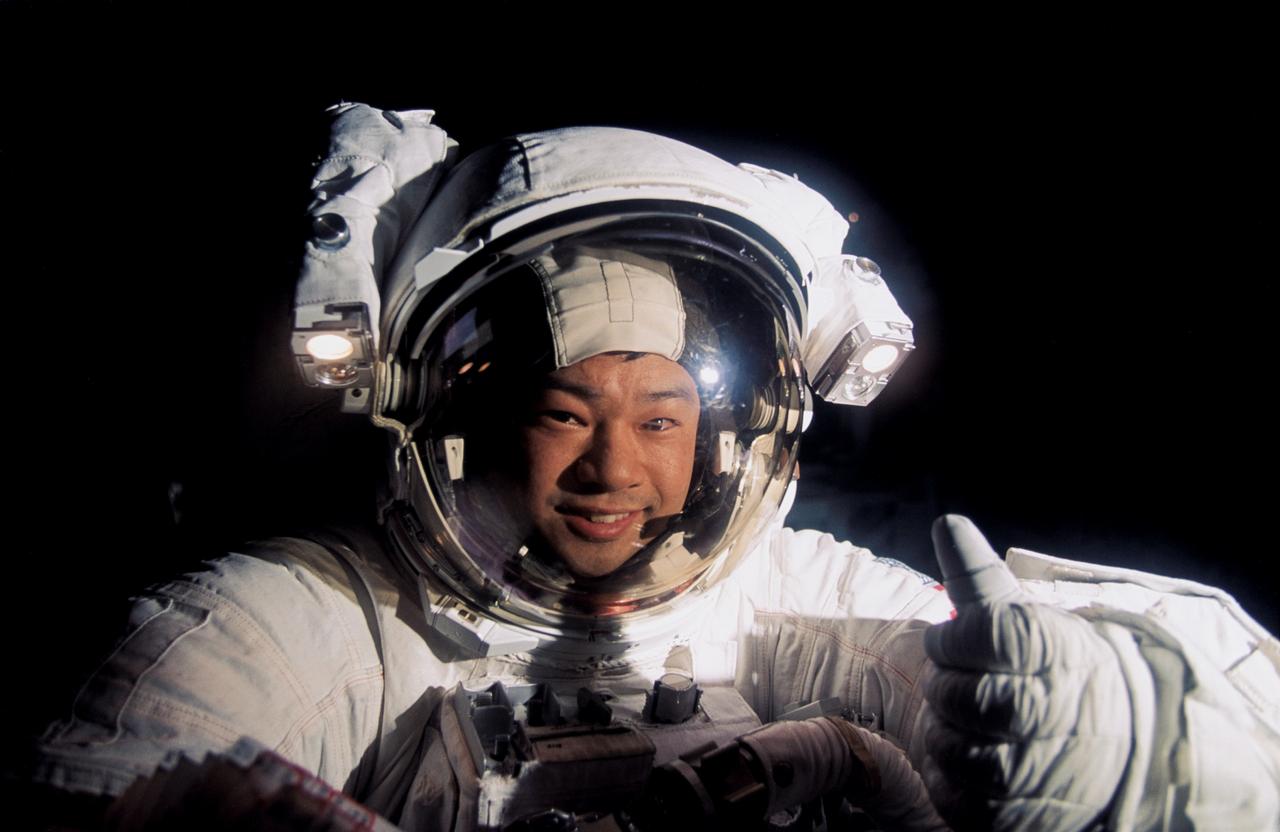 STS072-393-008 (17 Jan. 1996) --- Astronaut Leroy Chiao gives a thumbs up signal, marking the success of his second extravehicular activity (EVA) in three days. Chiao was joined by astronaut Winston E. Scott on this EVA.