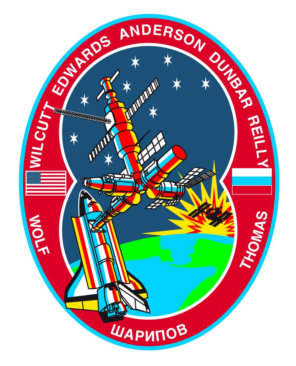 STS089-S-001 (October 1997) --- The link between the United States and Russia is symbolically represented by the space shuttle Endeavour and Russia?s Mir Space Station orbiting above the Bering Strait between Siberia and Alaska. The success of the joint United States-Russian missions is depicted by the space shuttle and Mir colored by the rising sun in the background. A shadowed representation of the International Space Station (ISS) rising with the sun represents the future program for which the Shuttle-Mir missions are prototypes. The inside rim of the insignia describes the outline of the number eight representing STS-89 as the eighth Shuttle/Mir docking mission. The nine stars represent the nine joint missions to be flown of the program and ? when combined with the number eight in the rim -- reflect the mission number. The nine stars also symbolize the children of the crew members who will be the future beneficiaries of the joint development work of the space programs of the two countries. Along the rim are the crew members? names with David A. Wolf?s name on the left and Andrew S. W. Thomas? name on the right, the returning and upgoing cosmonaut guest researcher crew members. In between and at the bottom is the name of Salizan S. Sharipov, mission specialist representing Russian Space Agency (RSA), in Cyrillic alphabet. The other crew members are Terrence W. Wilcutt, commander; Joe F. Edwards Jr., pilot; and mission specialists Michael P. Anderson, Bonnie J. Dunbar, and James F. Reilly. The red, white and blue of the rim reflect the colors of the American and Russian flags which are also represented in the rim on either side of the joined spacecraft.    The NASA insignia design for space shuttle flights is reserved for use by the astronauts and for other official use as the NASA Administrator may authorize. Public availability has been approved only in the forms of illustrations by the various news media. When and if there is any change in this policy, which is not anticipated, the change will be publicly announced. Photo credit: NASA