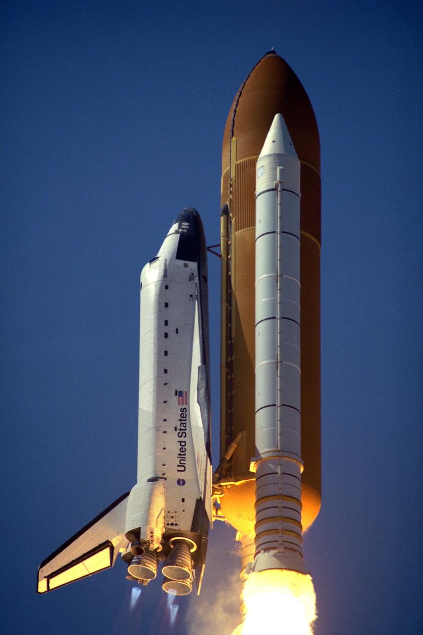 STS099-S-021 (11 February 2000) --- The Space Shuttle Endeavour is backdropped against a clear blue sky as its launches toward space.  Launch of the STS-99 mission occurred at 12:43:40 p.m. (EST), February 11, 2000 from Launch Pad 39A with a crew of six aboard.  This is the 97th shuttle flight and the 14th for Space Shuttle Endeavour.