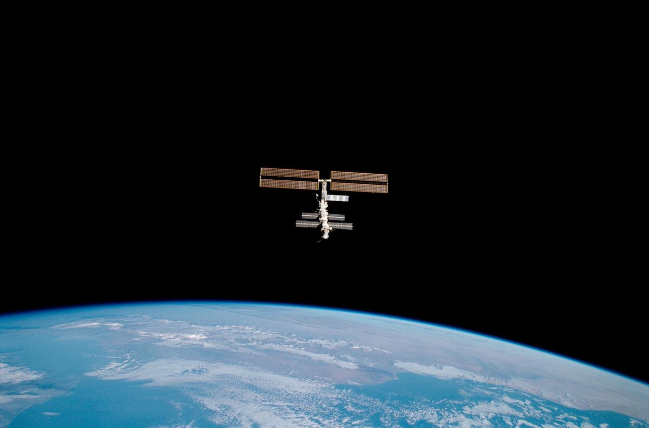 STS100-356-035 (29 April 2001) --- The International Space Station (ISS) is photographed above the Earth limb horizon during a fly-around by the Space Shuttle Endeavour.