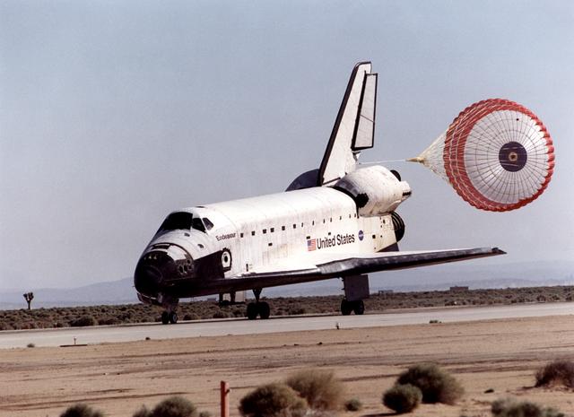 NASA image: View of Endeavour deploying its drag chute during STS-100's landing at Edwards AFB