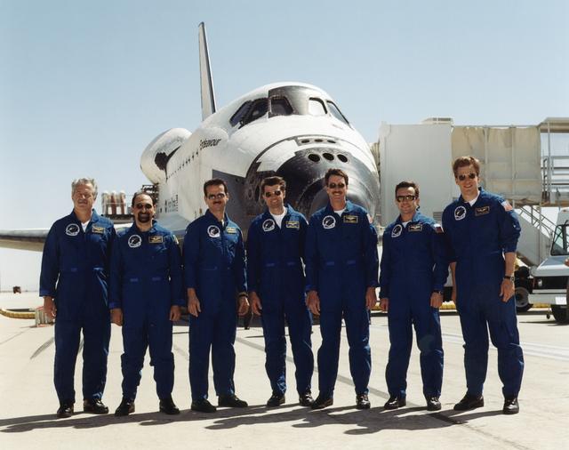 NASA image: The STS-100 crew pose in front of Endeavour after landing at Edwards AFB