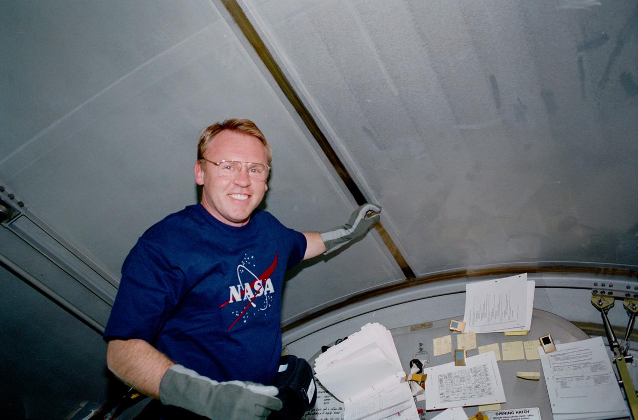 STS102-317-008 (8&#0150;21 March 2001) --- Astronaut Andrew S. W. Thomas, STS-102 mission specialist is photographed here in the Leonardo Multi-Purpose Logistics Module (MPLM) which was built by the Italian Space Agency (ASI).  The MPLM is the first of three such pressurized modules that will serve as the International Space Station&#0146;s &#0147;moving vans&#0148;, carrying laboratory racks filled with equipment, experiments and supplies to and from the station aboard the space shuttle.