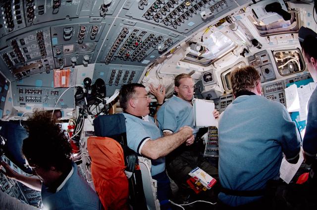 NASA image: STS-102 flight deck activity during post-docking ops with the ISS